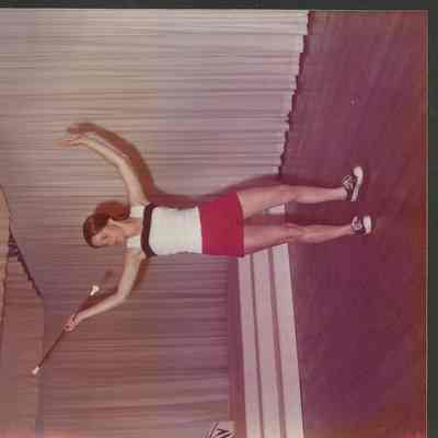 Nancie Prince at rehearsal coordinating their baton routine.