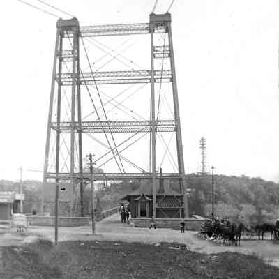 Electric Power Poles and a Walking Bridge