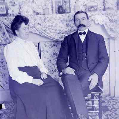 Alfred LeTarte and a lady sitting.