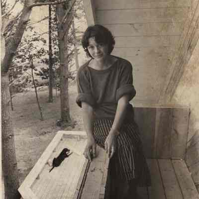 A photo view of a lady sitting. 9/16/1982.