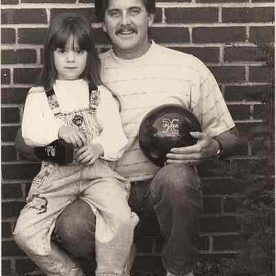 A photo view of a man and his daughter. 11/3/1992.