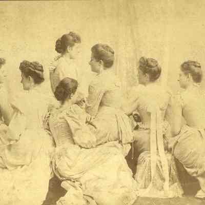 A photo of 7 women.