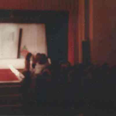 Melody Johnson, Autumn Ison and Lisa Kelly giving a rose to their parents.