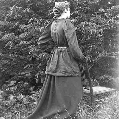 Unknown Woman Holding Chair