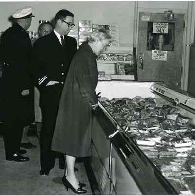 Four people at the Brunswick Naval Air Station Commissary