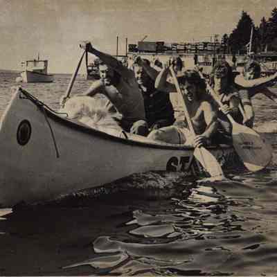 A photo view of Robet Waddle paddling a canoe. 6/20/1975.