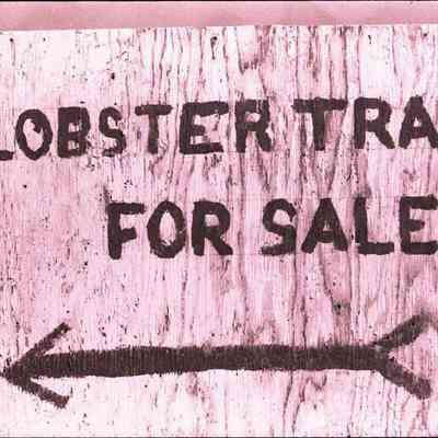 A photo view of a sign at the lobster trap maker's house. 10/17/1981.