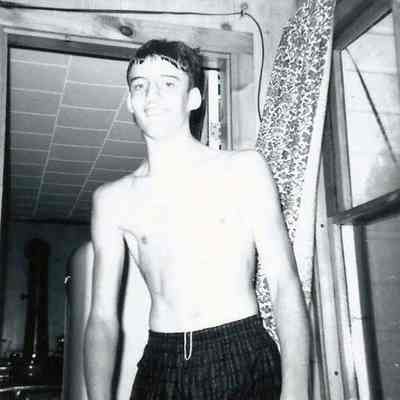 A B/W photograph of an unknown young man.