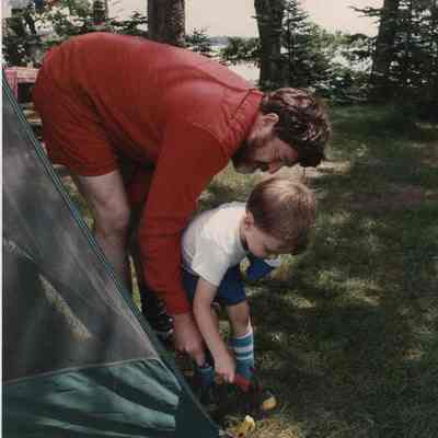 A photo view of a boy and his father. 7/10/1989.