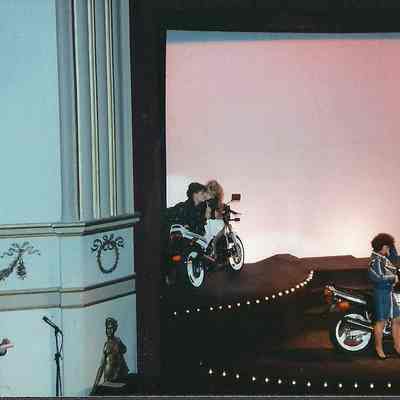 people performing with motorcycles.