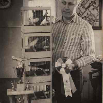 A photo view of Ralph Knowles and his canaries. 12/20/1978.