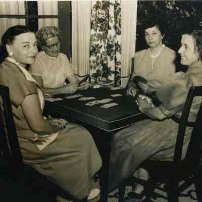 Four Ladies Playing Cards
