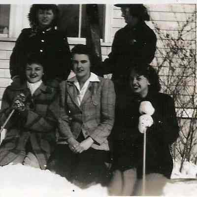 Five Unidentified Women Sitting in the Snow