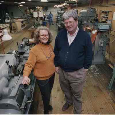 A photo view of a couple in a machine shop. 3/25/1992.