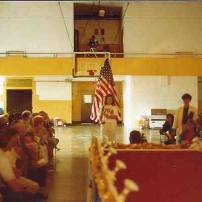 Participants entering the hall.