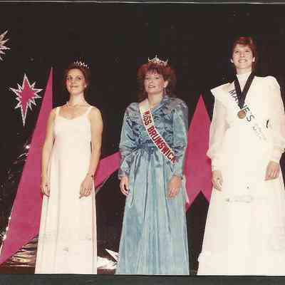 A color photograph of three queens.
