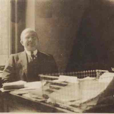 Man Sitting at a Desk