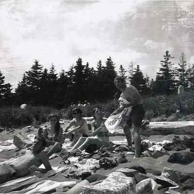 A B/W photograph a beach scene.
