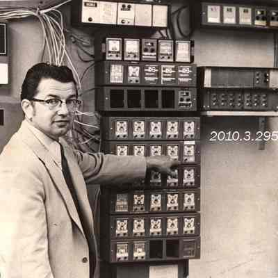 Rene Sylvester Beside the Alarm System