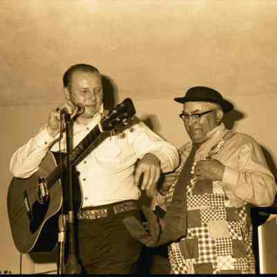 A photo view of two performers. 7/6/1977.