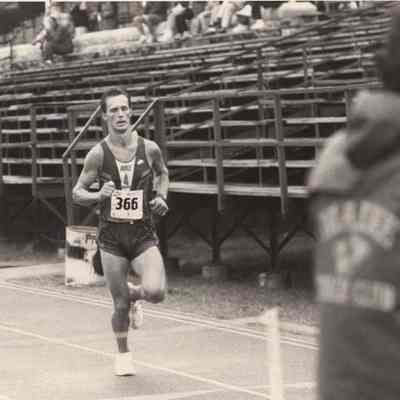 A photo view of a man running. 8/17/1992.
