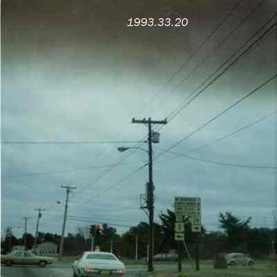 A photo of he traffic light at Cook's Corner. 3/1973