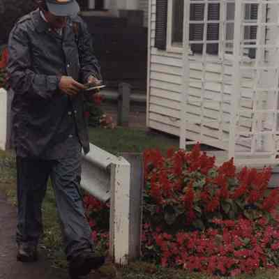 A photo view of a mail man. 10/17/1989.