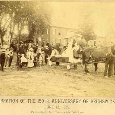 Masked parade participants, 150th Anniversary of Brunswick