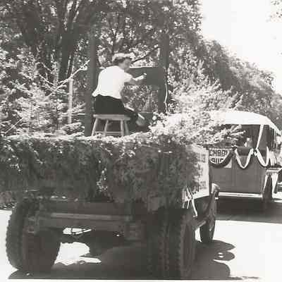 Truck with someone in Stocks in Brunswick's 200th Anniversary Parade