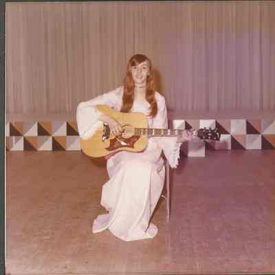 Mary Ann Licameli contestant #4 playing guitar and singing at dress rehersal.