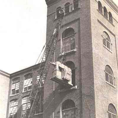 Crane Removing Machinery from the Verney Mill Building