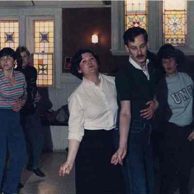 A photo view of a group rehearsing. 2/15/1989.