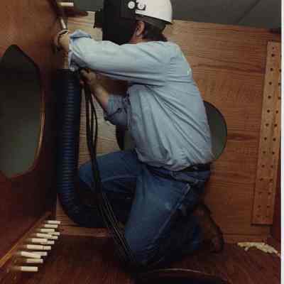 A photo view of a workman. 11/27/1989.