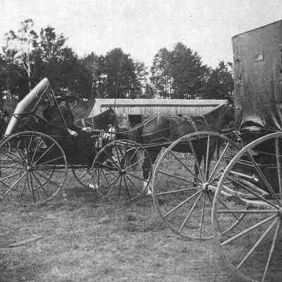A photo of carriages park at the Topsham Fair.