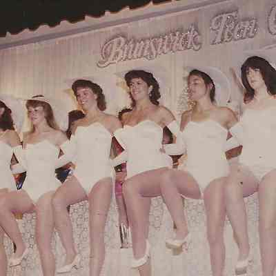 A color photograph of the contestants.