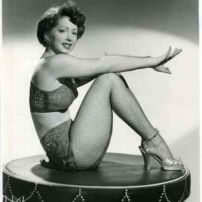 Woman Sitting on a Pedestal