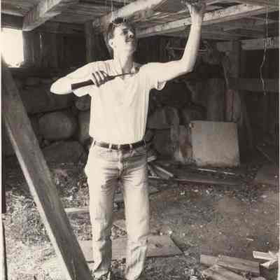 A photo view of a carpenter at work.