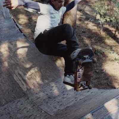A photo view of a boy skate boarding. 10/3/1989.