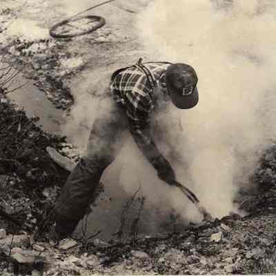 A photo view of Walter Lucas using a steamer. 1/28/1992.
