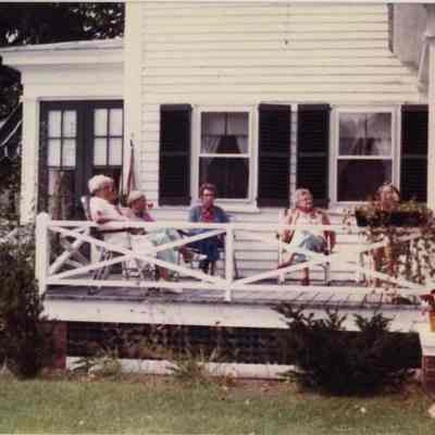 People Sitting on the Porch at the Stevens Home