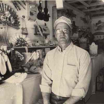 A photo view of a man in Post Road Crafts store. 5/27/1992.