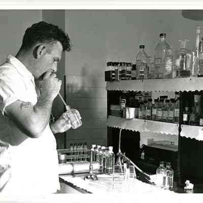 Lab Technician Testing Water, BNAS