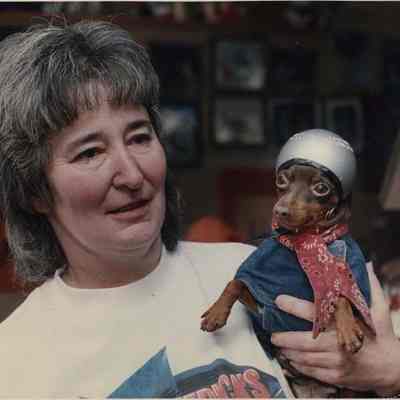 A photo view of Georgette Curran and dog. 2/7/1992.