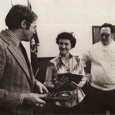 A photo view of Charlotte Y. Guptill receiving an award.
