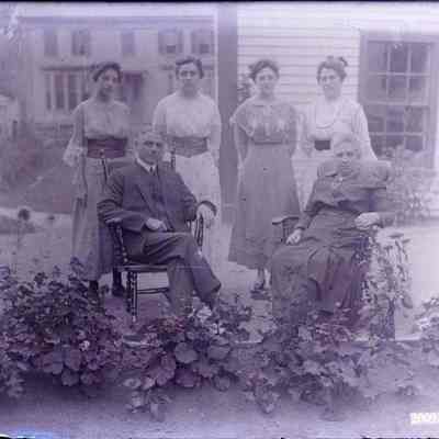 A group scene outside in a garden.