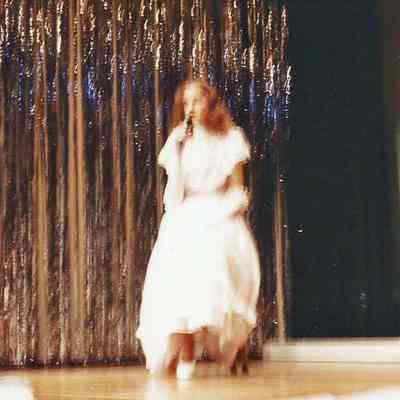 Charity Edwards singing for her talent presentation.