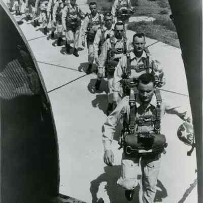 A photo of the "Chuting Stars" parachutists getting on a plane.