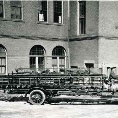 A photo of the "Ladder 1" fire truck. c. 1920.