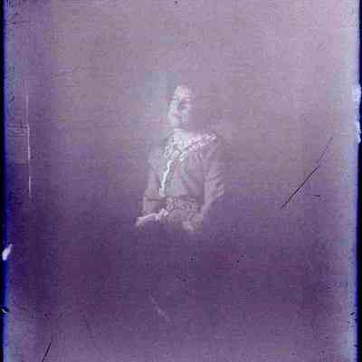 A woman seated.