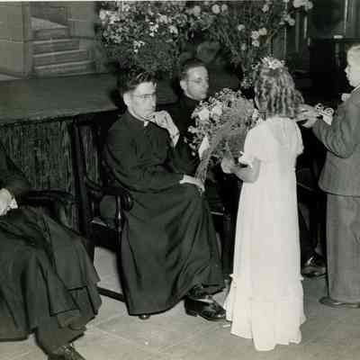Three Priests and Two Small Children with Gifts